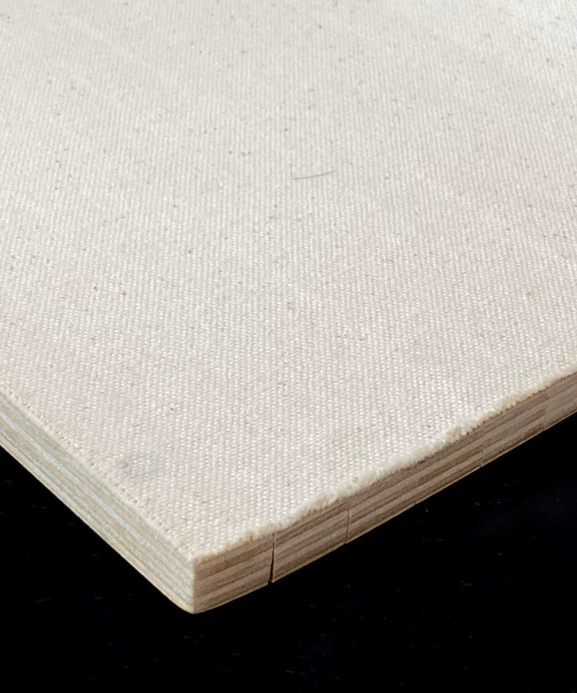 The lids are made from ½” wide slats glued to a canvas backing, similar to a tambour door. This construction allows the lids to be flexible and conform to the curved profile of the toolbox.